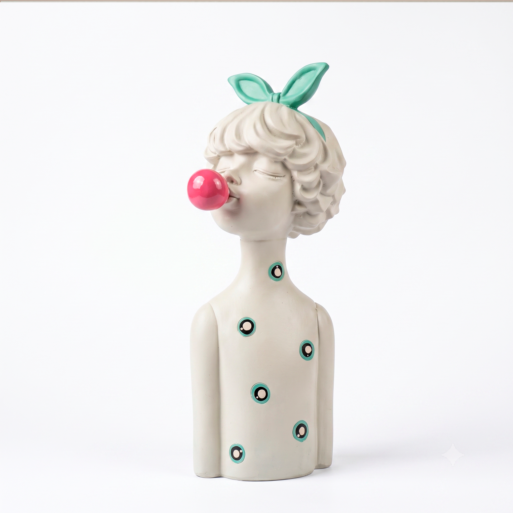 Figura decorativa niña con lazo y globo, vista frontal en resina blanca con círculos turquesa, fondo blanco