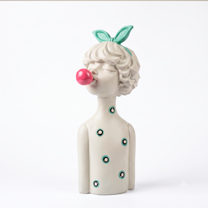 Figura decorativa niña con lazo y globo, vista frontal en resina blanca con círculos turquesa, fondo blanco