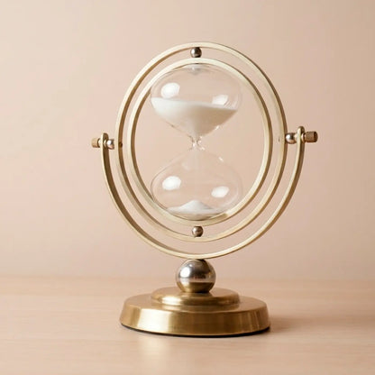 Accesorio decorativo de lujo reloj de arena dorado Loft Mobiliario Medellín.