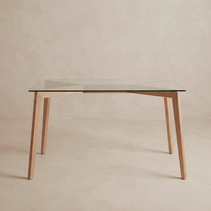 Mesa en madera con superficie de vidrio estilo minimalista para comedor